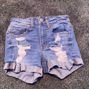 Light blue ripped denim shorts